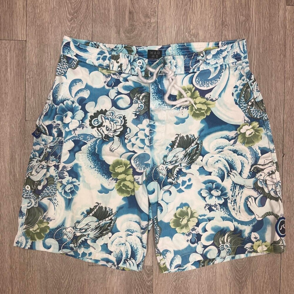 Rip Curl blue, white, and green dragon floral print cotton board shorts size 33